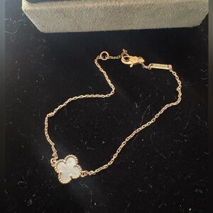 Van Cleef & Arpels Gold and White Clover Sweet Alhambra bracelet
18K yellow gold